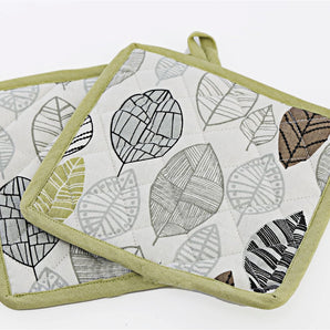 Two Fabric Pot or Pan Mats With Contemporary Green Leaf Print Design