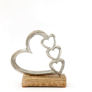 Metal Silver Four Heart Ornament On A Wooden Base Small